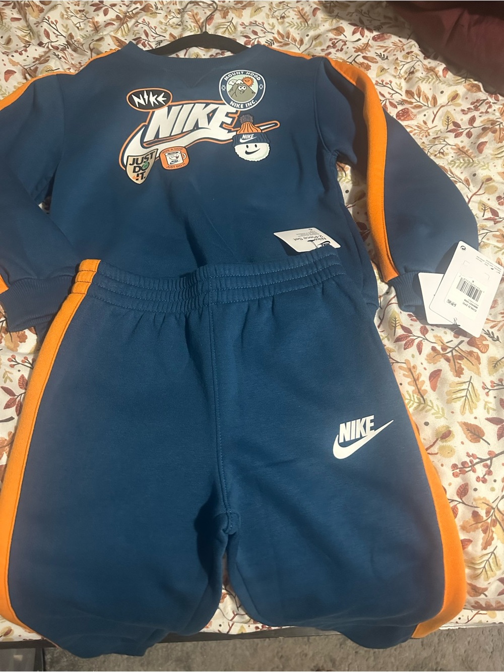 Nike Kids Navy Blue Sweatpants with Orange Stripes